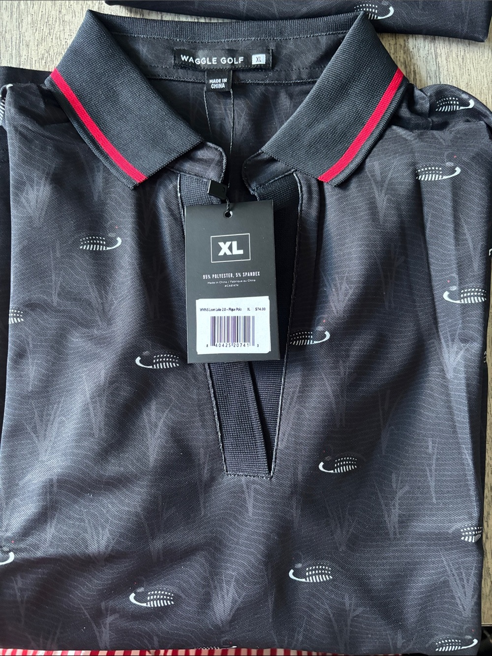 Women’s Waggle Golf Polo Black with loon print